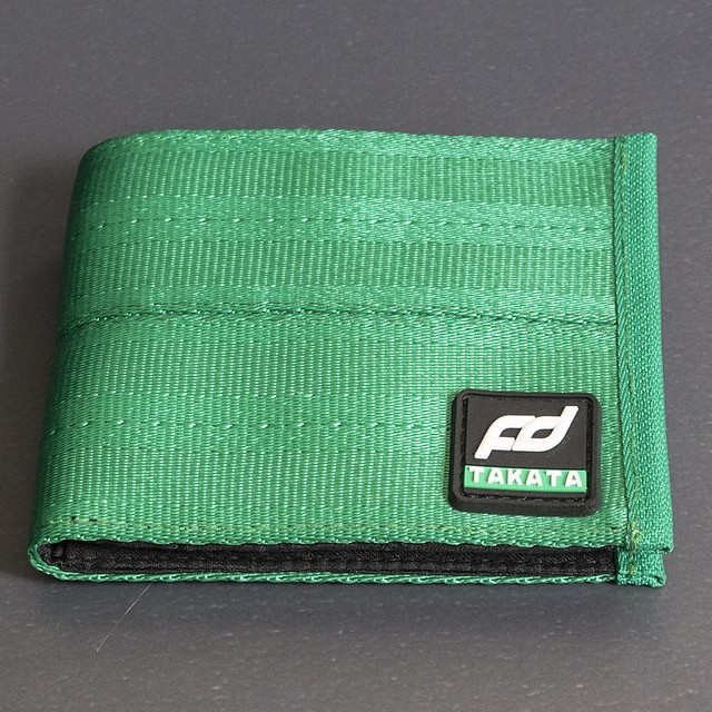 @takataracingusa and Formula Drift have teamed up to create one of the most distinctive wallets on the market today. Hand woven out of Takata Green seatbelt webbing, this wallet turns heads wherever it goes. The black interior accommodates a clear ID window, four credit cards and a money slot. Sold as a limited edition item, only 300 have been released to the public. Visit www.shopfd.com or check out the Official Formula DRIFT Merchandise booth at Round 2 - Road Atlanta! #formulad #formuladrift #fdatl