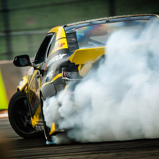 Smoke 'em up! A fresh pair of rear tires last about 45 seconds of drifting on the @rockstarenergy @hankookusaracing @scionracing tC. #holdstumt