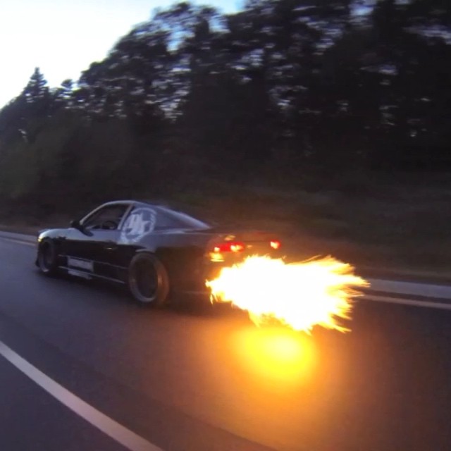 Some D-way donuts and highway flames from the 1JZ 240. Hit the link in my profile to visit my youtube page and check the full video. #RT411 #flameslayer @thehoonigans
