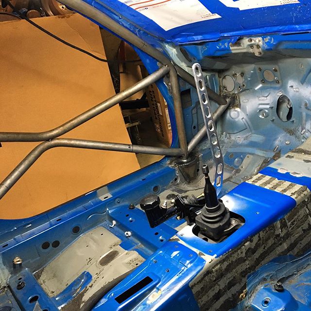 My new chassis is almost ready for paint as @dylanhughes129 finishes the final pieces of the roll cage, door bar gussets and the dash bar. I blocked out all of the holes in the firewall and @bwillkillperson located my @asdmotorsports handbrake in the same location as my competition cars for that natural feel.