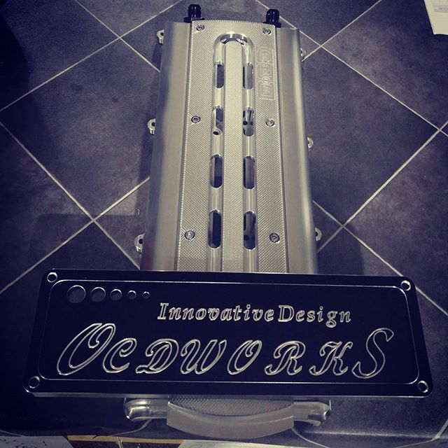 Ocdworks billet valve cover with one off door sign. It came out pretty nice. Custom design and plate can be made.