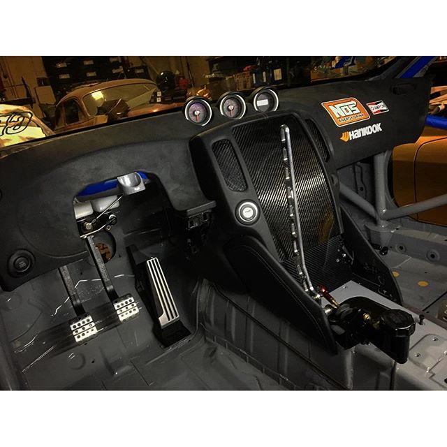 Finished fitting the dash to the chassis today, I also got these carbon plates in place of the factory navigation and climate control. I love the way the dash pockets around the handbrake and shifter!