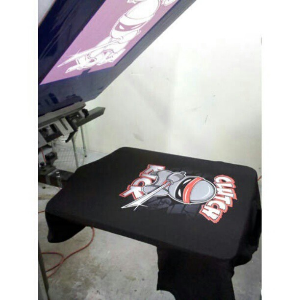 Printing clutch kick shirts at our shop