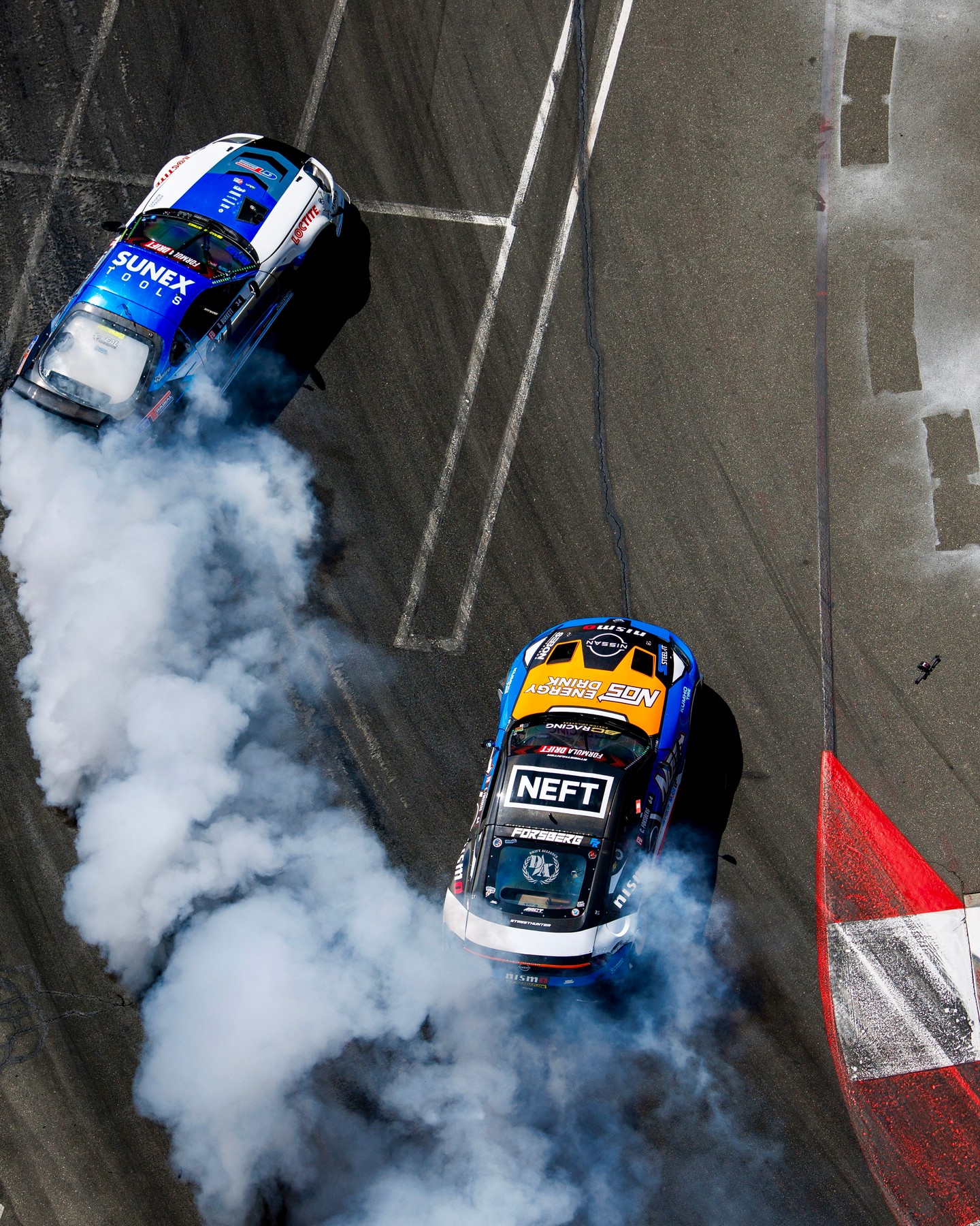 Don’t call it a pit stop — this is where the real fuel gets poured. 🛢️

Long Beach got the tire smoke. @NEFTVodka brought the flavor.